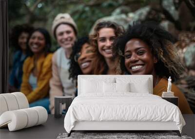 Portrait of group of friends smiling and having fun together in the park Wall mural