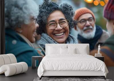 Portrait of happy senior woman with friends in the background. Group of senior friends having fun together. Wall mural