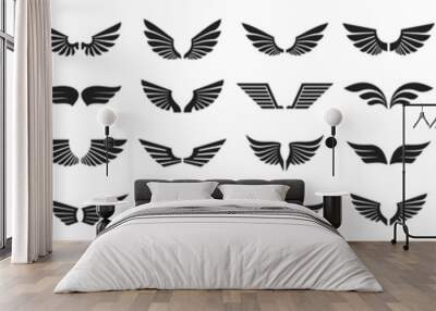 Set of black wings icons. Wings badges. Collection wings badges. Vector illustration. Wall mural