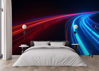 Abstract motion blur light trail background, blue and red neon color on black night sky for speed effect in highway road tunnel or cityscape with futuristic concept of technology Wall mural