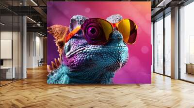 Chameleon with sunglasses on a solid color background. Wall mural