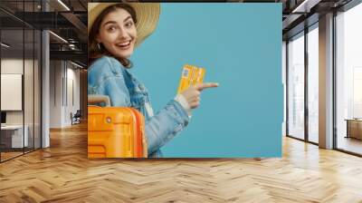 The happy woman with tickets Wall mural