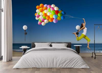 Jumping with balloons Wall mural