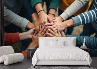 Stack of hands showing unity and teamwork Wall mural