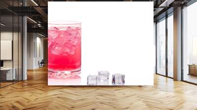 A glass of summer red drink and ice  isolated on white background. Wall mural