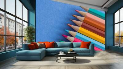 color pencils on blue background Wall mural