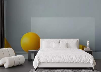 A collection of three dimensional yellow geometric shapes set against a gray background Basic shapes The cube balances on one edge of the triangle while the cylinder floats above. Copy space image Wall mural