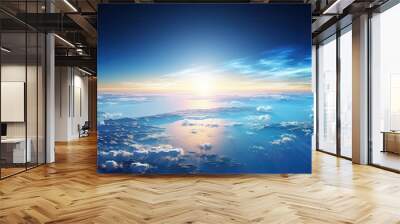 A serene blue sunrise captured in a breathtaking aerial view showcasing planet Earth with a vast expanse of copy space image Wall mural