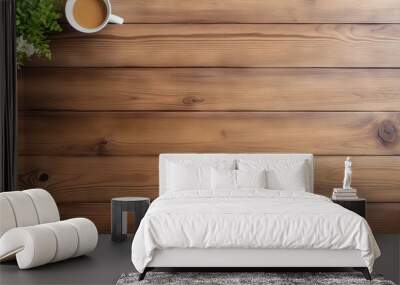 A top down view of a wooden desk in an office with a white sheet providing empty space for placing objects or taking photos. Copy space image. Place for adding text and design Wall mural