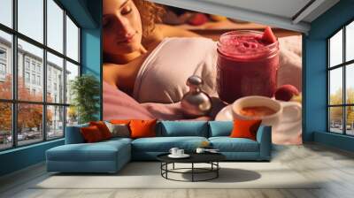 A young girl lye on her bed and drinking her beetroot soup Healthy homemade soup. Copy space image. Place for adding text Wall mural