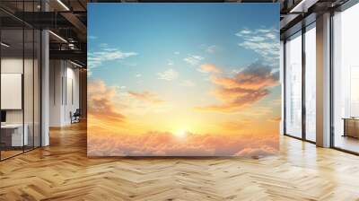 An incredible summer sunset view with a beautiful yellow and orange sky above a sun drenched blue sky with clouds providing ample copy space image Wall mural