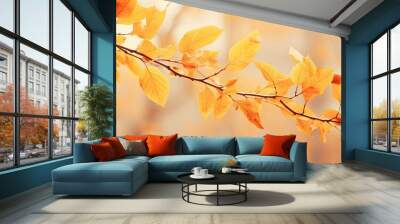 Autumnal branches adorned with golden leaves create a captivating nature background The beauty of autumn is depicted in this close up image offering ample copy space The photo is enhanced with an abs Wall mural