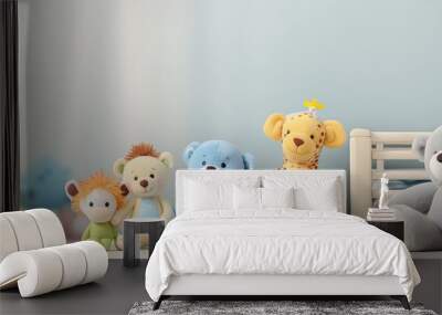 baby monitor camera between stuffed animals and toys on the crib shelf. Copy space image. Place for adding text or design Wall mural