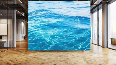 Clear blue water surface with gentle ripples Wall mural