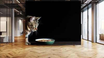 Curious Tabby Cat Enjoying a Meal from a Kitchen Bowl with Relish and Satisfaction Wall mural