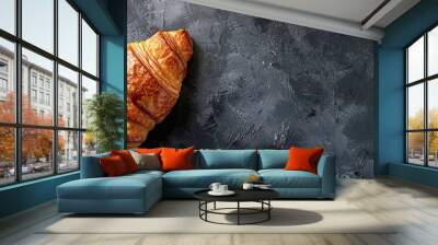 Fresh croissant on a dark background Top view copyspace Wall mural