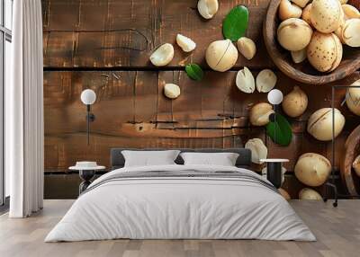 Macadamia nuts arranged on a wooden table with copy space image Wall mural