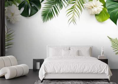 Nature concept flat lay with a creative arrangement of flowers and leaves around a paper card note, creating a visually appealing copy space image. Wall mural