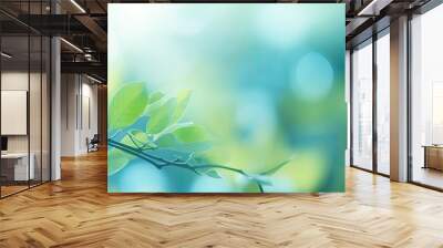 Nature inspired abstract blur background featuring out of focus leaves creating bokeh effect ideal for a copy space image Wall mural