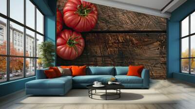 Raw ripe pink heirloom organic tomatoes on a wooden surface Vegetarian Vegan healthy diet culinary cooking idea Top View. Copy space image. Place for adding text and design Wall mural