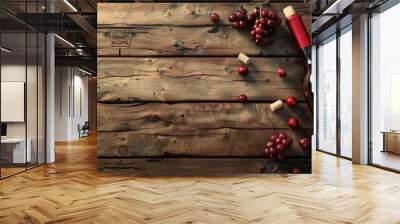 Red wine bottle with grapes and corks on a wooden surface creating a rustic look with surrounding empty space for additional elements in the image Wall mural