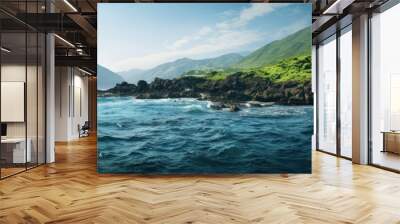 Scenic view of a wild lush green island with rocky terrain in the sea ideal for a copy space image Wall mural