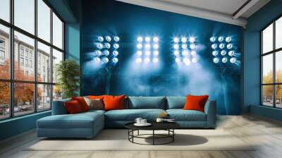 Soccer stadium lights shining with reflection on a black background creating a copy space image Wall mural