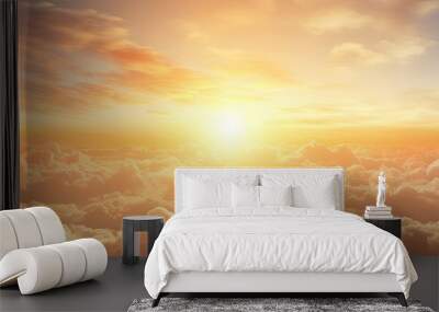 Sunrise scenery with fluffy orange and yellow clouds in the early morning creating a beautiful golden hour summer background with copy space image Wall mural