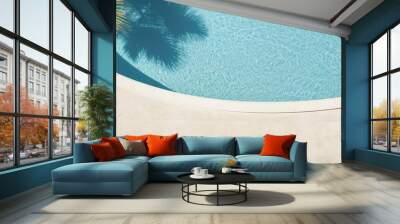 Top down view of a swimming pool background with a water ring and palm shadow visible on the travertine stone perfect for copy space images Wall mural