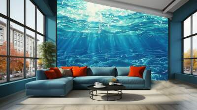 A glimpse into the depths of the ocean, with sunlight illuminating the blue abyss. Wall mural