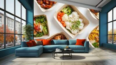 Food in takeout boxes, representing food delivery with a focus on healthy meal options. Concept of ordering tasty nutritious food. Wall mural