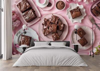 Assorted brownies arranged on a pink table, perfect for celebrating Valentines Day with sweet treats Wall mural