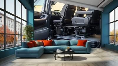 The interior of a minivan is designed for accessibility, featuring a spacious layout and a wheelchair securement area, perfect for convenient transportation Wall mural