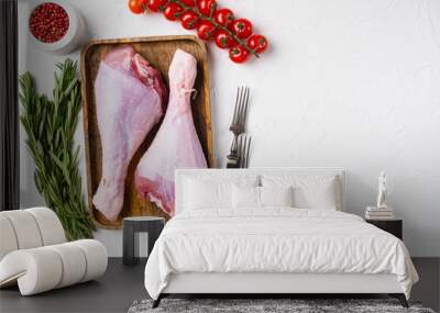 Turkey raw meat leg set, on white stone table background, top view flat lay, with copy space for text Wall mural