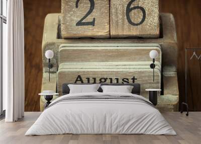 A very old wooden vintage calendar showing the date 26th August Wall mural