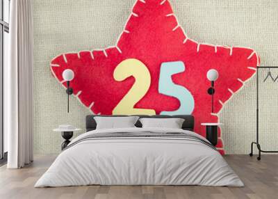 concept for christmas, red star with wooden numbers 25 on vintag Wall mural