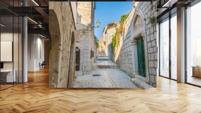 Narrow stone street in town of Rab, Croatia Wall mural