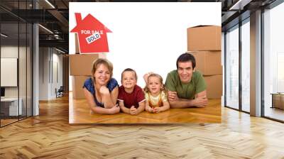 Happy family in their newly bought house Wall mural