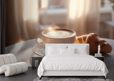 Morning Delight: Freshly Brewed Coffee and Golden Croissant on Sunny Tabletop with Soft Floral Background. Wall mural