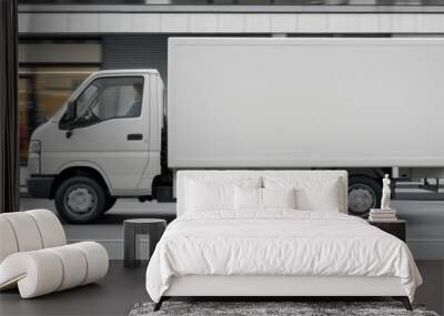 New White Delivery Truck Driving on a City Street That Is A Modern Cargo Transportation Vehicle. Wall mural