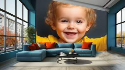 Portrait of Joyful Child Showing Thumbs Up Gesture on Gray Background, Happiness for Concept design Wall mural