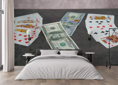 The combination of Flash Royal cards on a gray table with money and gold. Close-up. Poker game Wall mural