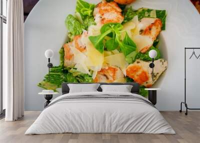 This fresh salad features grilled chicken breast on a bed of crisp lettuce, juicy cherry tomatoes, crunchy cucumbers, and colorful carrots, all drizzled with zesty vinaigrette for a nutritious meal. Wall mural