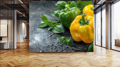 Vibrant yellow bell peppers covered in water droplets for a fresh vegetable backdrop Wall mural