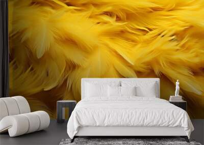 Vibrant yellow feather texture background with intricate details and large bird feathers Wall mural