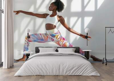 Young woman in trendy athletic wear yoga pose on white backdrop, wellness campaign with copy space Wall mural