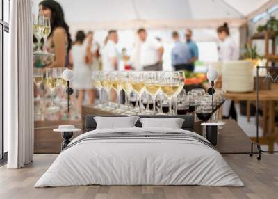 Set of wine and juice glasses on the banquet Wall mural