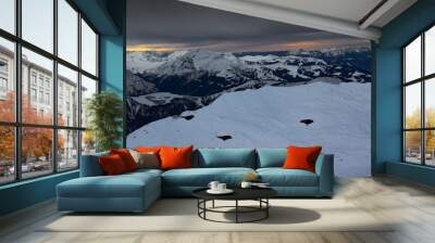 crows over a ski resort. drama sky. high resolution photo. Wall mural