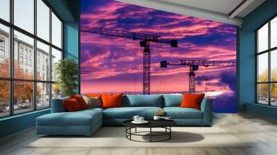 banner Construction site with cranes on purple sunset. Wall mural