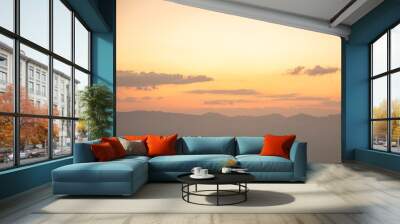 Silhouettes of mountains in a beautiful gentle haze, mountains at sunset or sunrise, natural background Wall mural